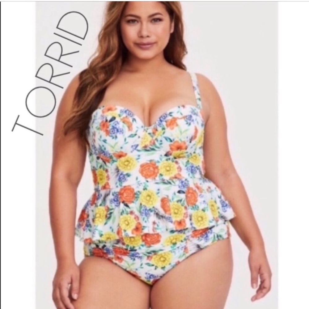 Torrid floral peplum swim top.